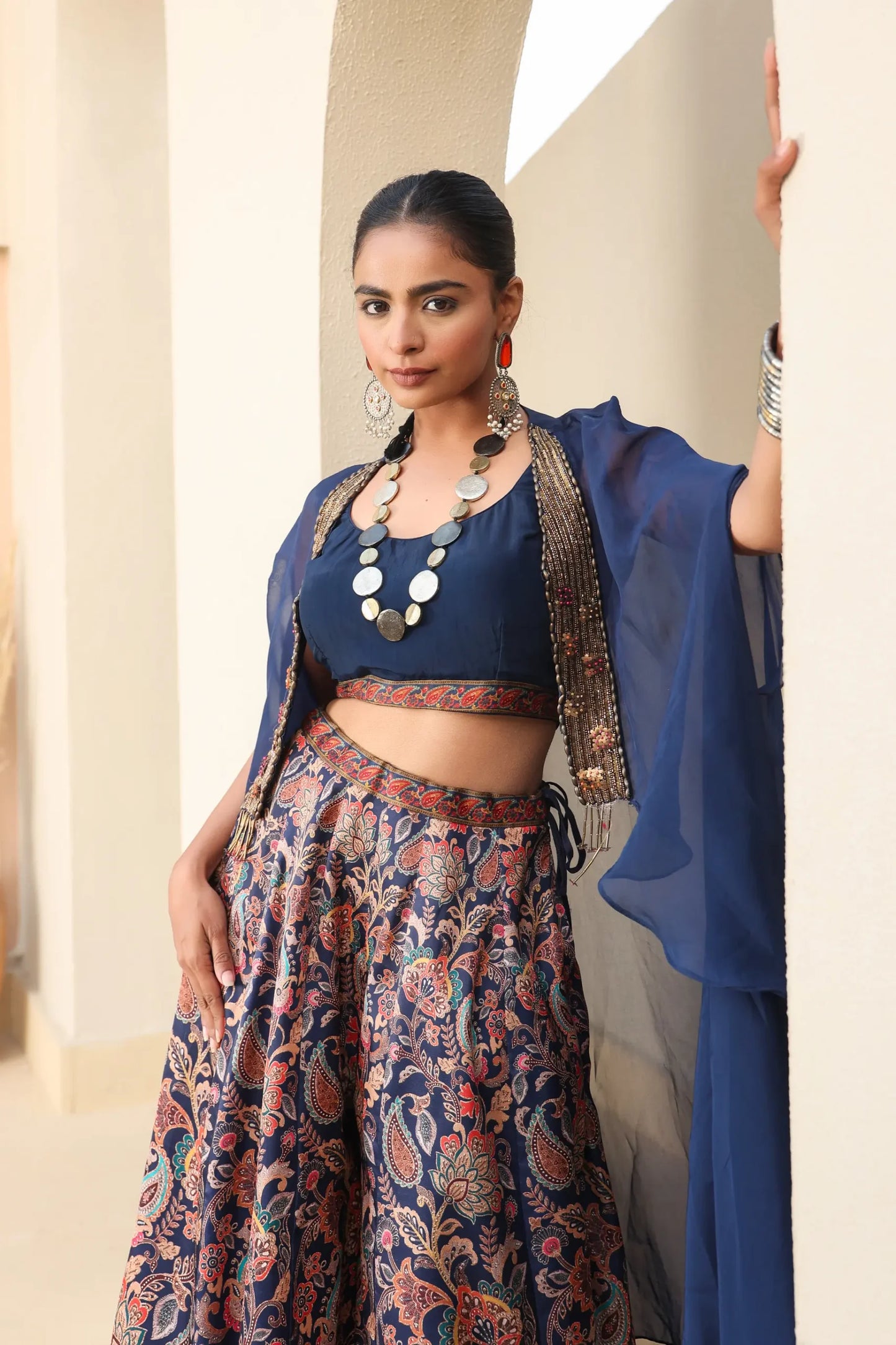 Traditional Print Sharara with Organza Embroidered Cape And Solid Blouse