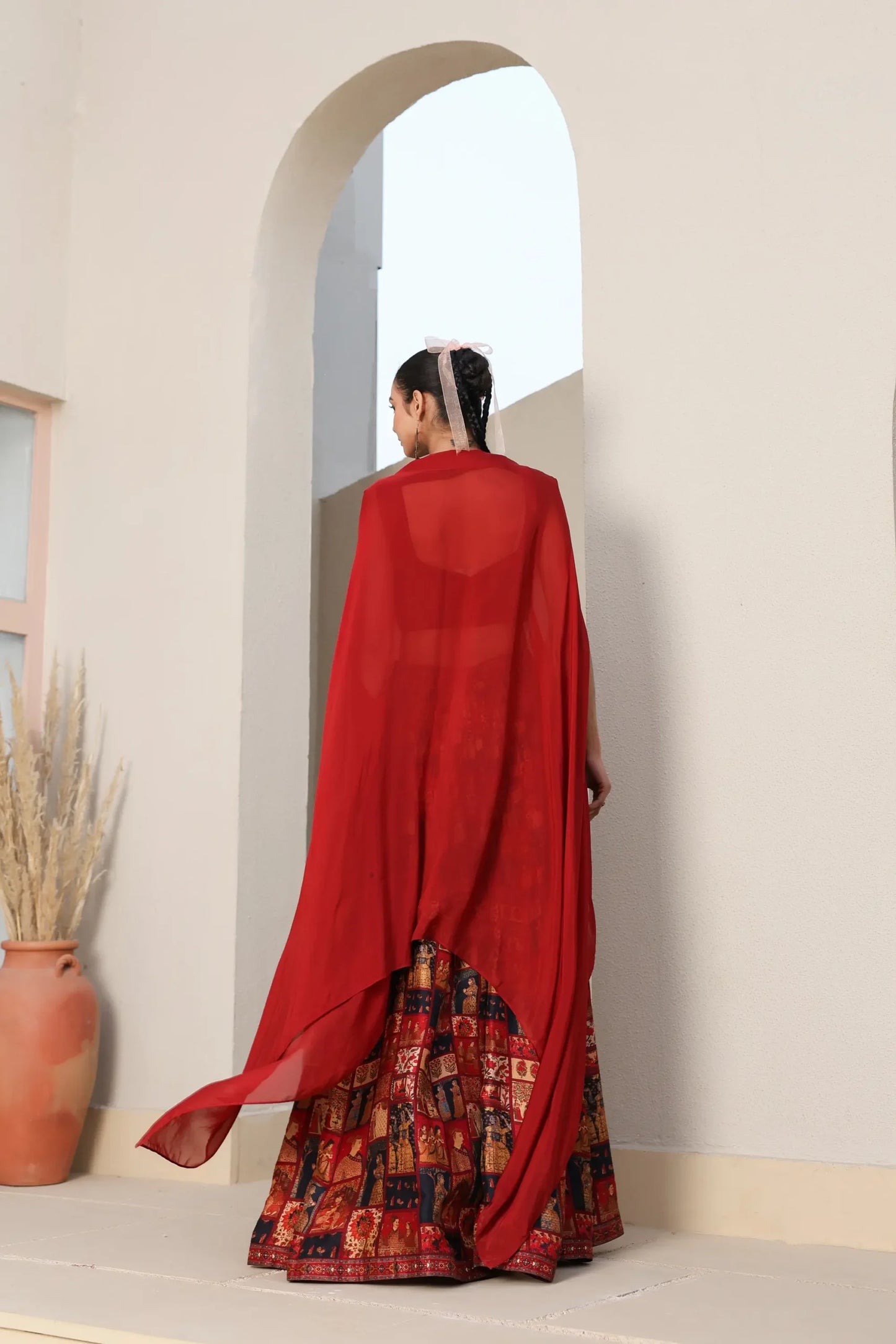Mughal Art Printed Sharara with Heavy Embroidered Blouse And Solid Cape