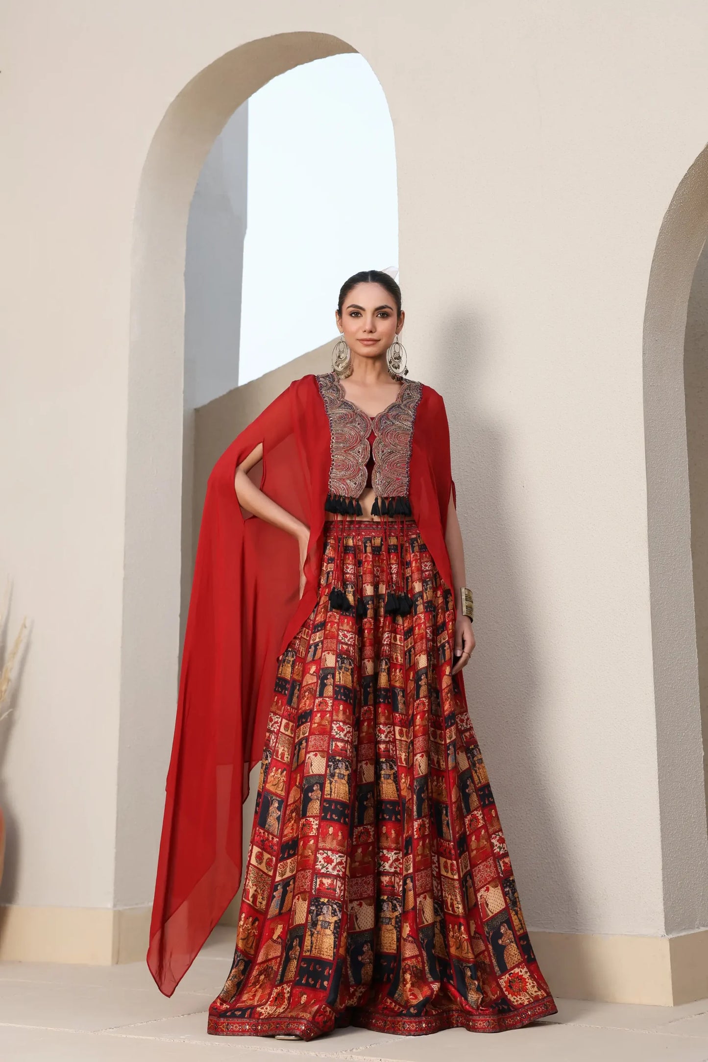 Mughal Art Printed Sharara with Heavy Embroidered Blouse And Solid Cape