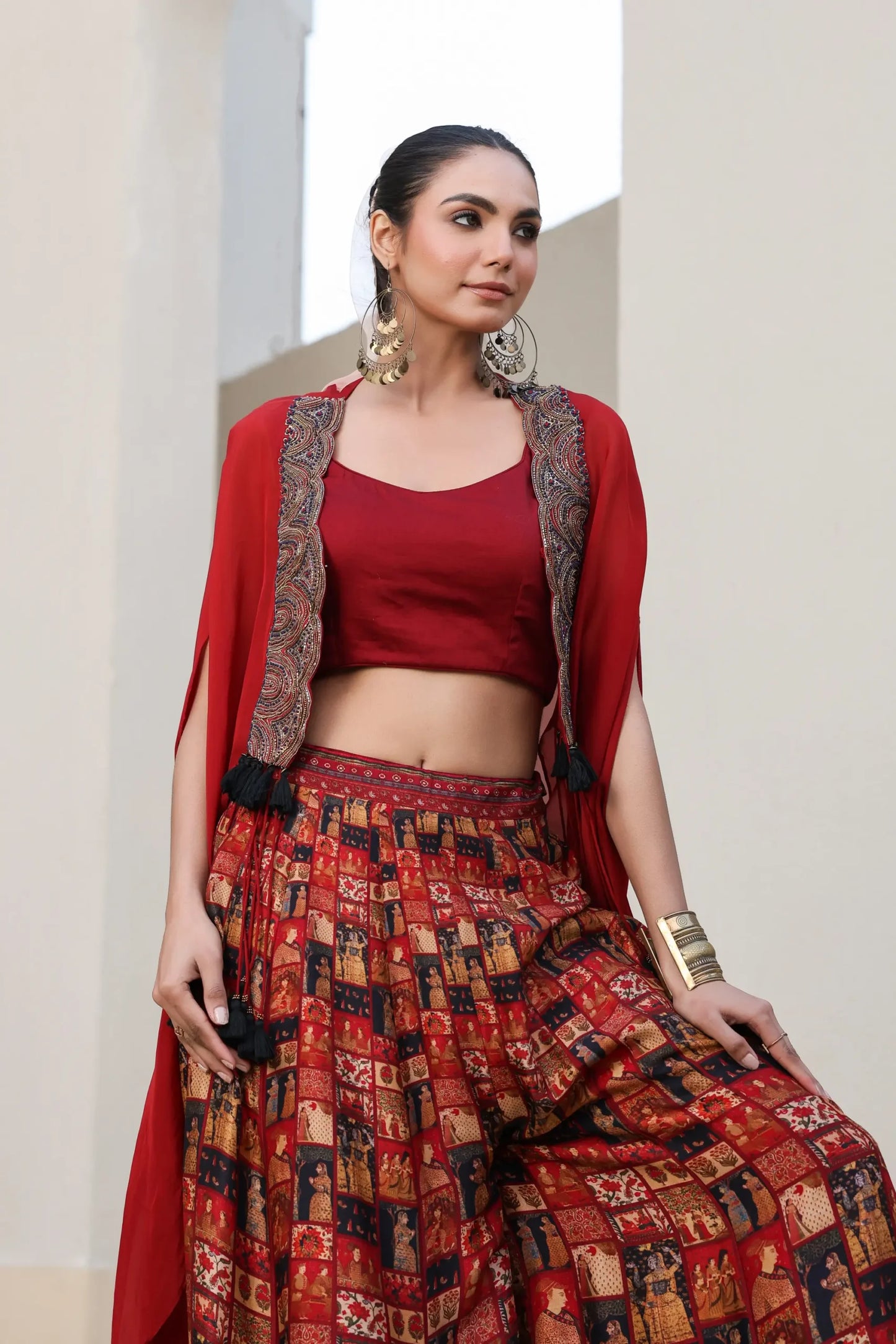 Mughal Art Printed Sharara with Heavy Embroidered Blouse And Solid Cape