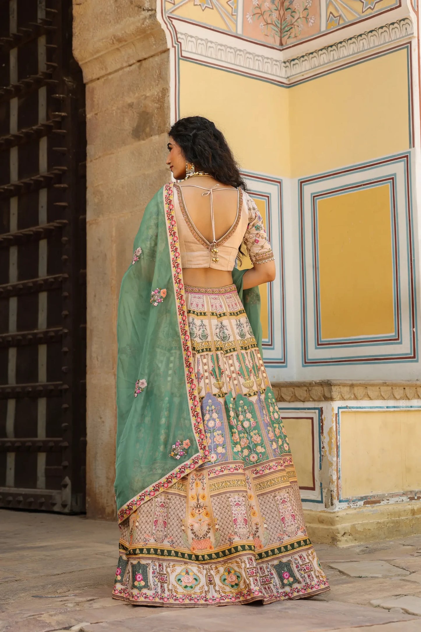 A traditional Kashmiri Print lehanga with embroidered blouse