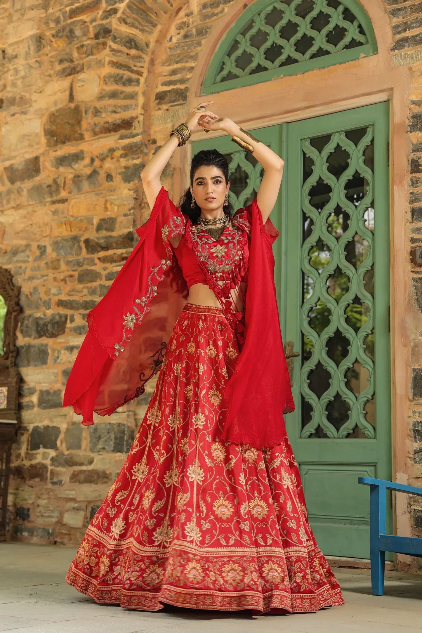 A red colour full traditional Print lehanga with heavy blouse & dupatta