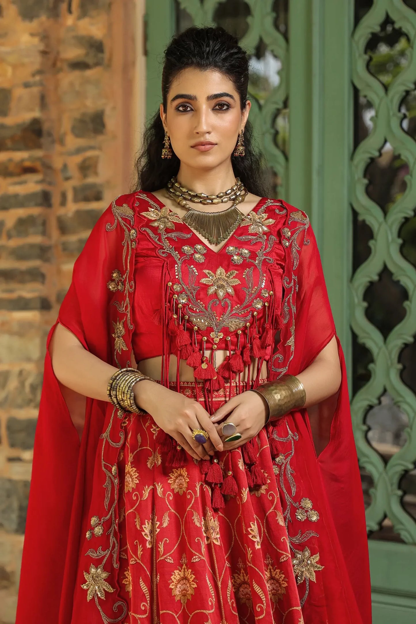 A red colour full traditional Print lehanga with heavy blouse & dupatta