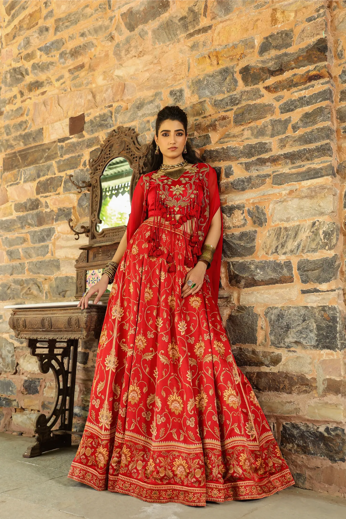 A red colour full traditional Print lehanga with heavy blouse & dupatta
