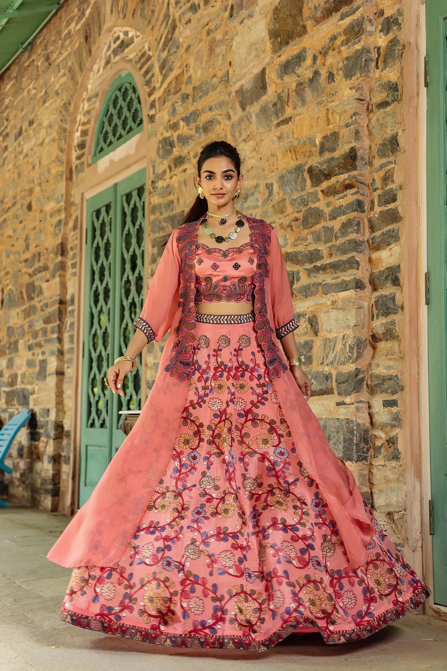 Peache colour kalamkari print lehanga with embroidered blouse and jacket