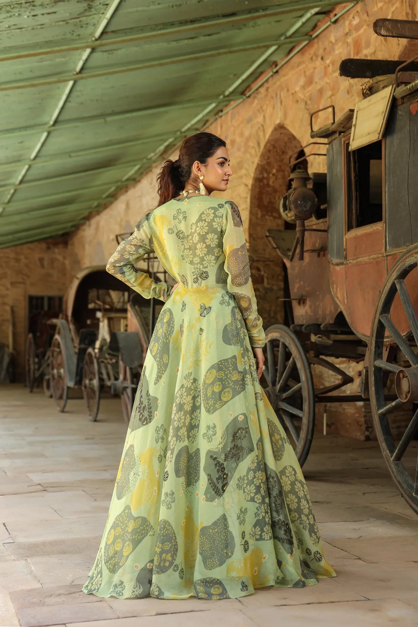 Olive Green colour full sleeves gown with embllished blouse and Divider Pant