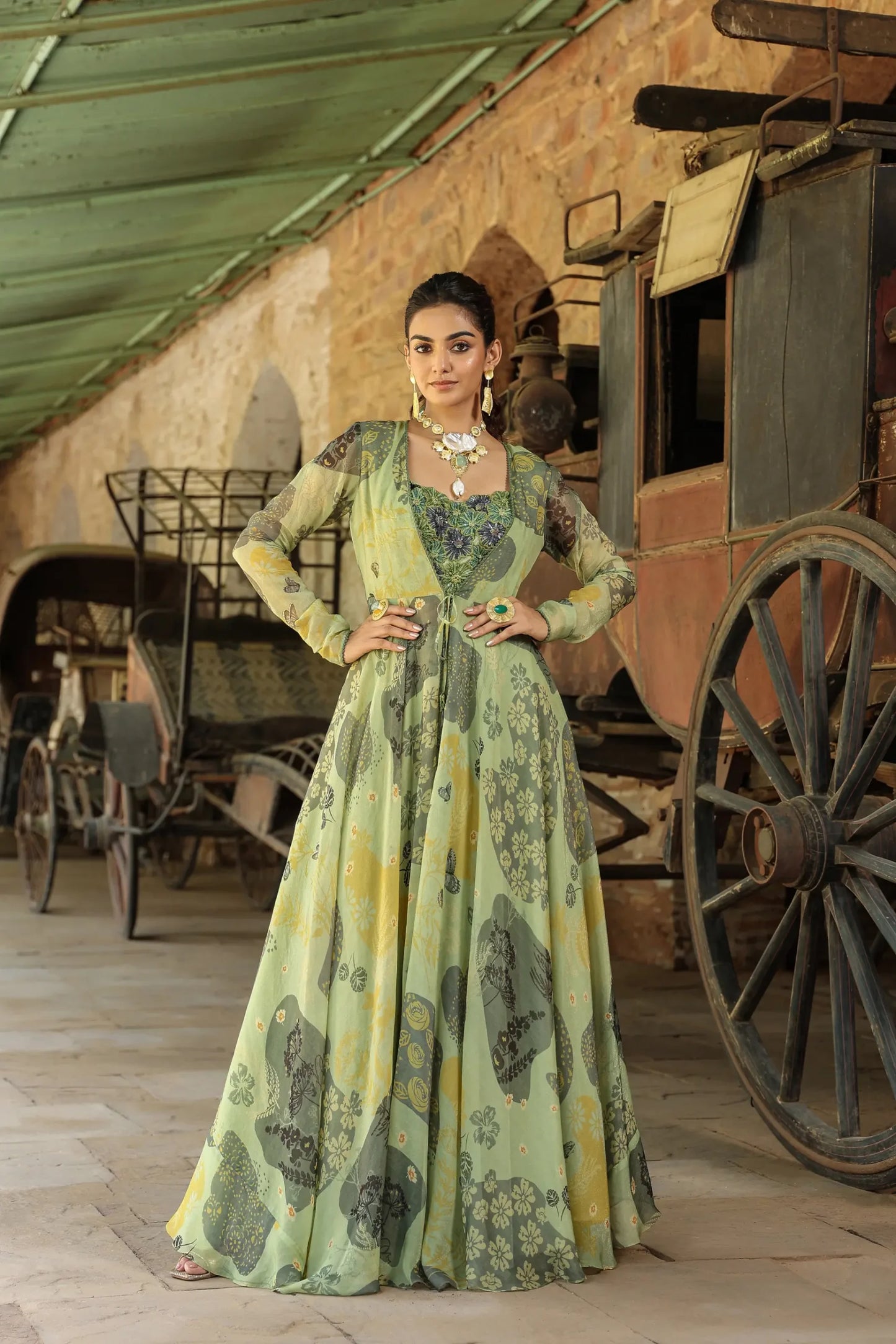 Olive Green colour full sleeves gown with embllished blouse and Divider Pant