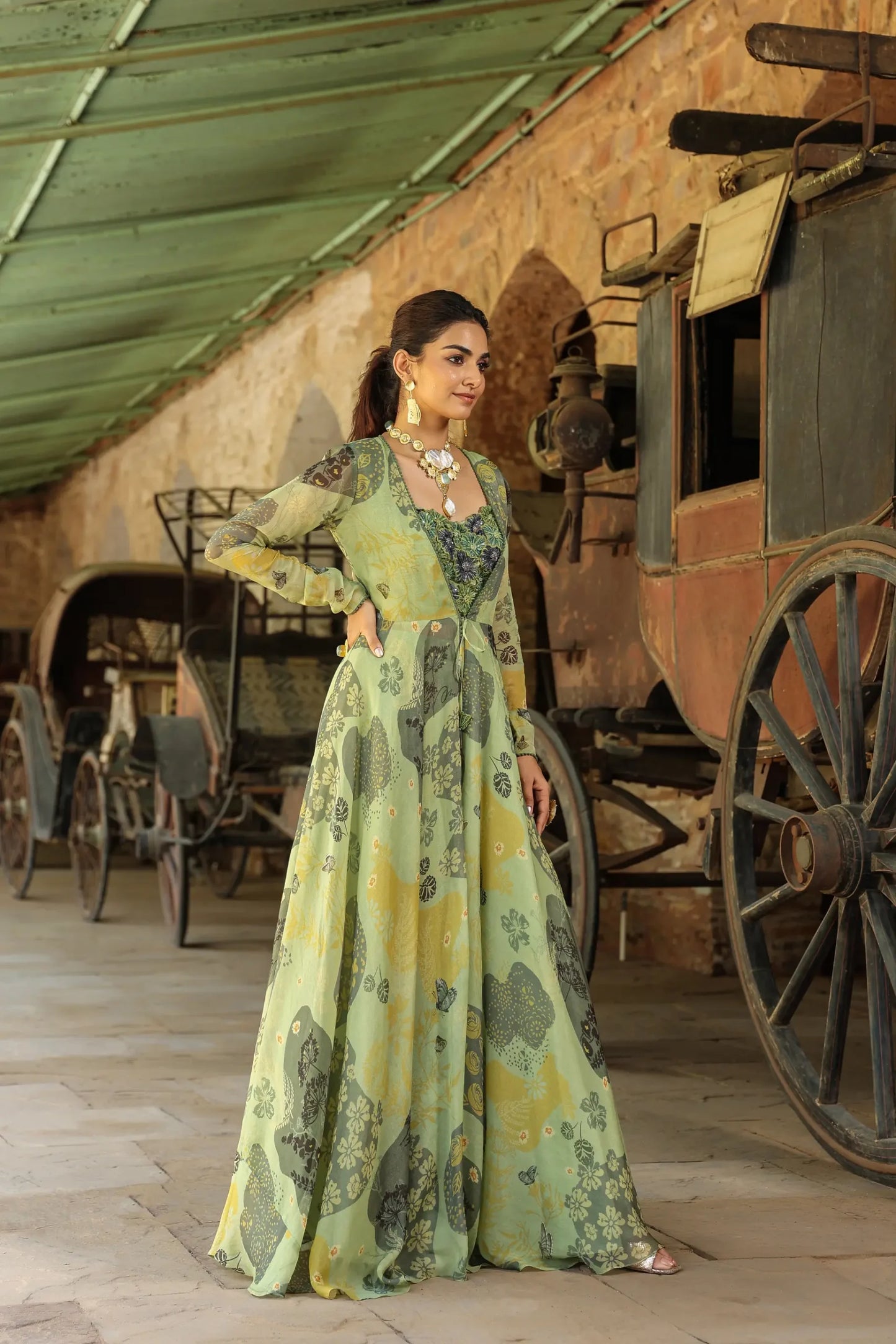 Olive Green colour full sleeves gown with embllished blouse and Divider Pant