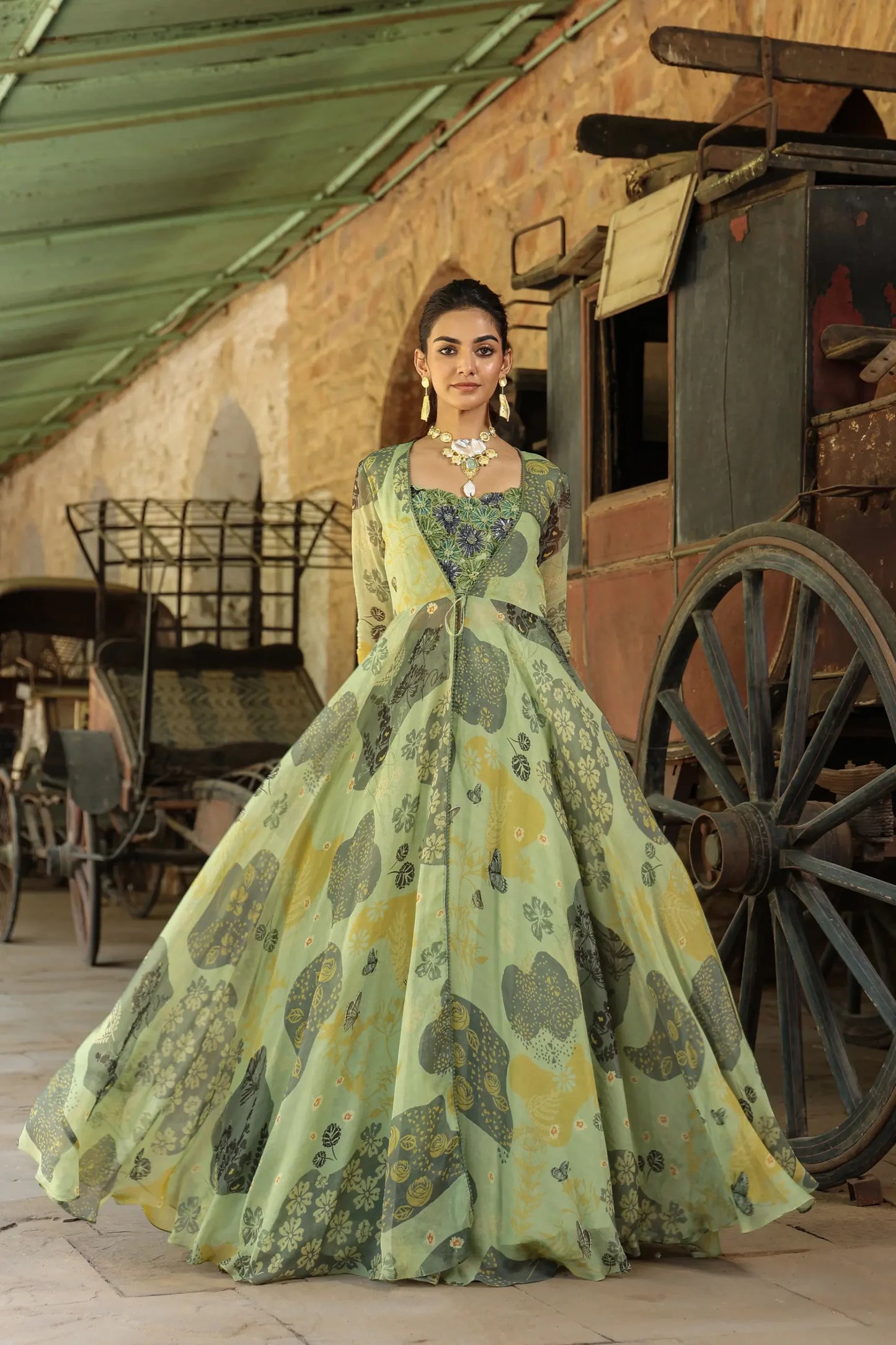 Olive Green colour full sleeves gown with embllished blouse and Divider Pant