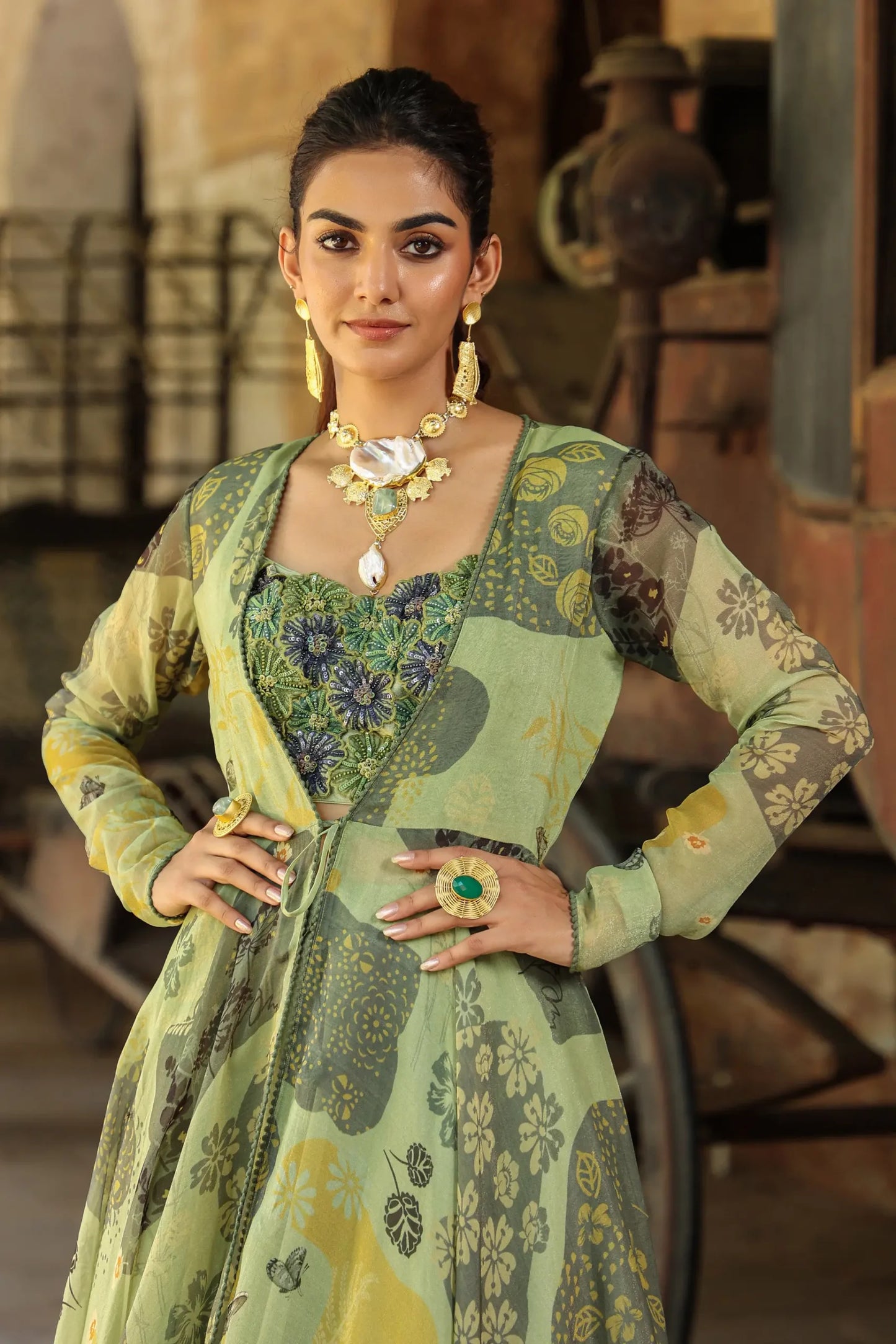 Olive Green colour full sleeves gown with embllished blouse and Divider Pant
