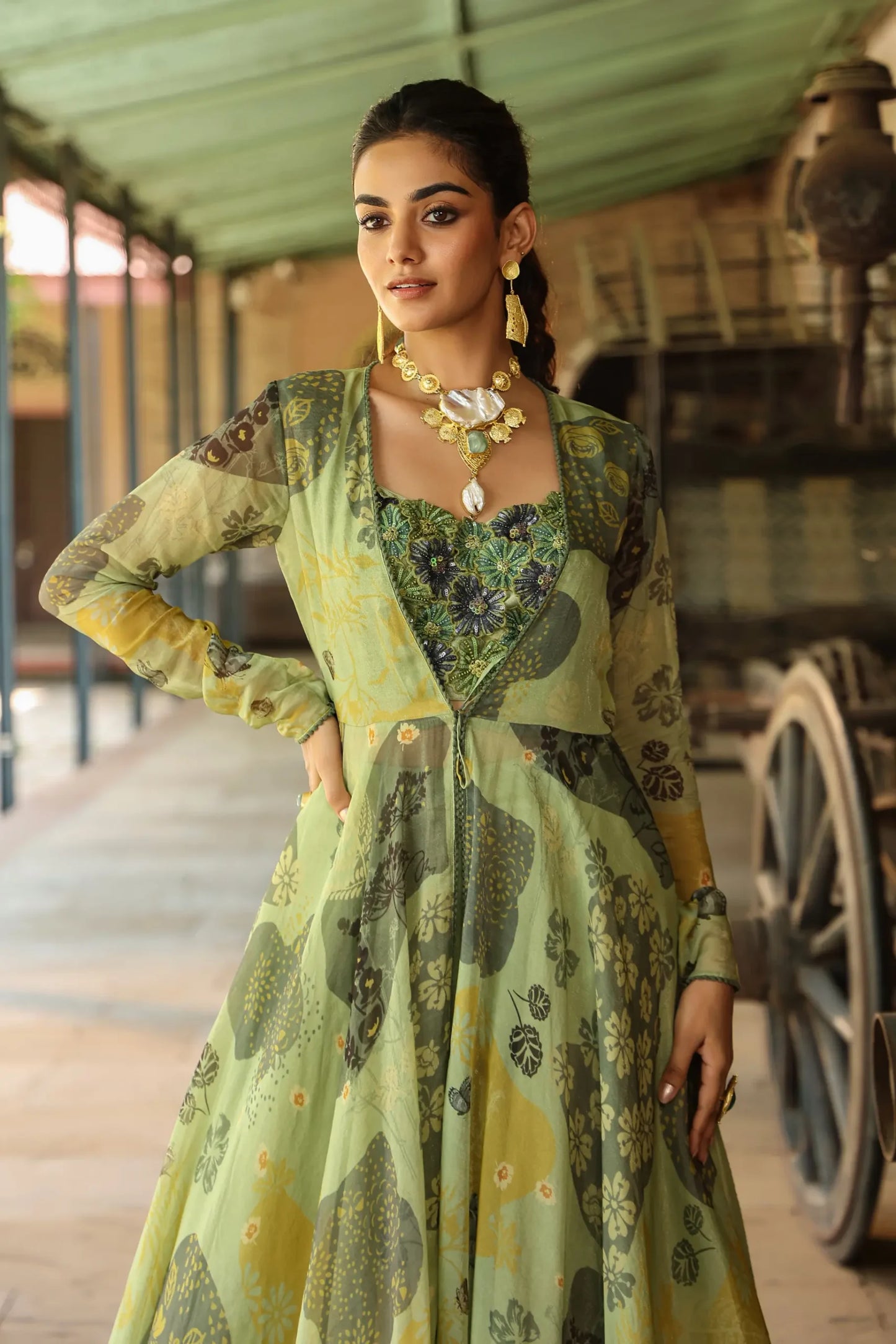 Olive Green colour full sleeves gown with embllished blouse and Divider Pant