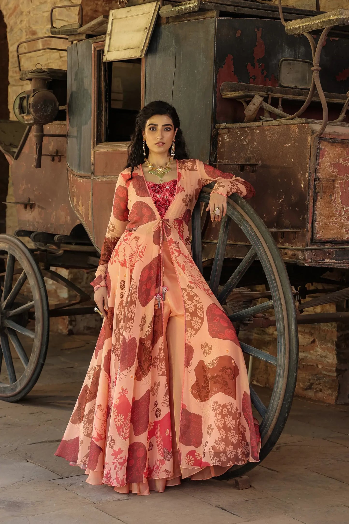 Peache colour full sleeves gown with embellished blouse and divider pant