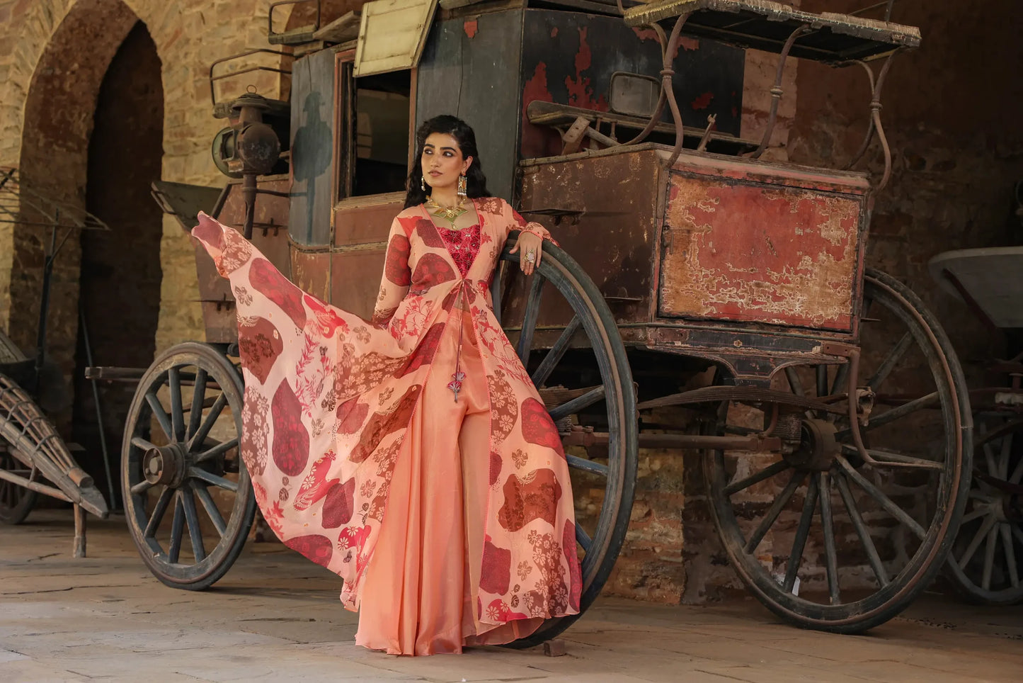 Peache colour full sleeves gown with embellished blouse and divider pant