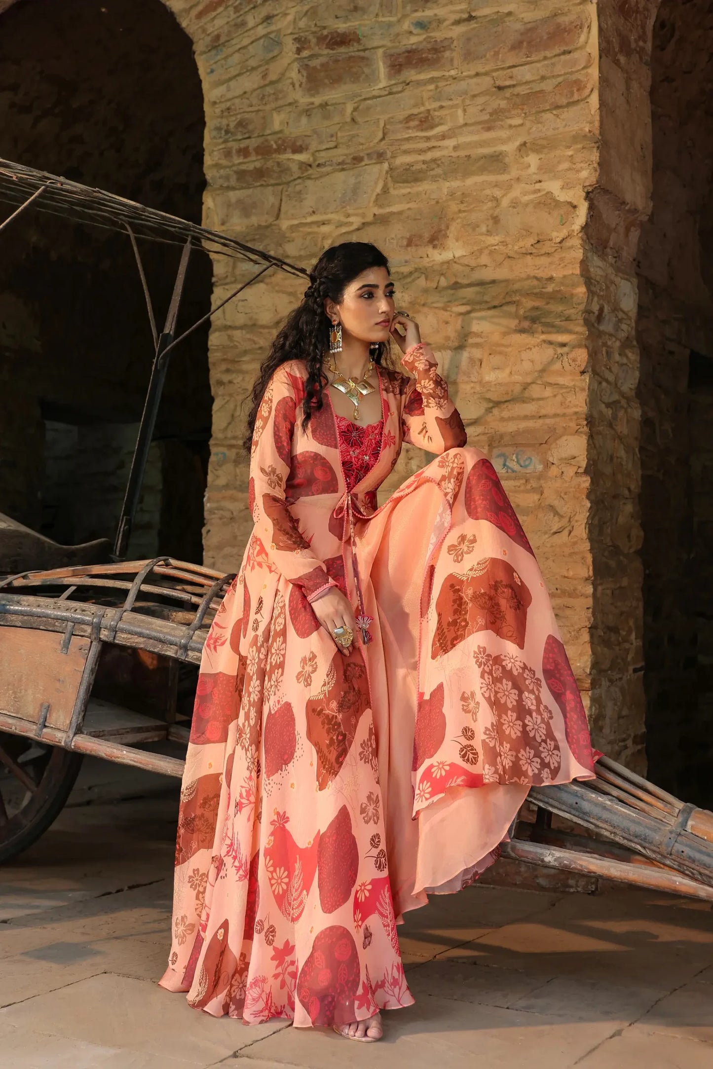 Peache colour full sleeves gown with embellished blouse and divider pant