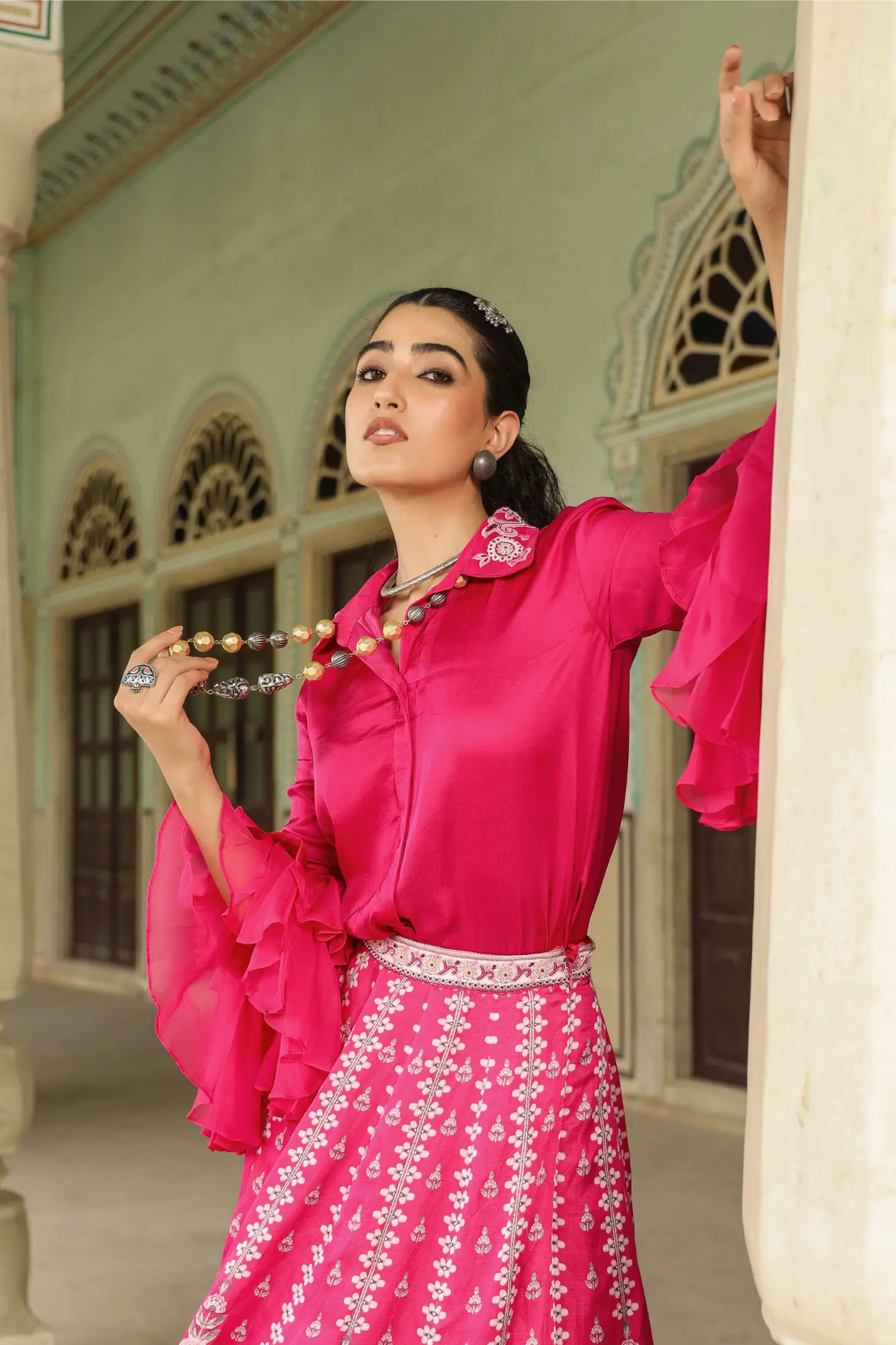 Rani pink traditional printed lehanga with stylist shirt with bell sleeves