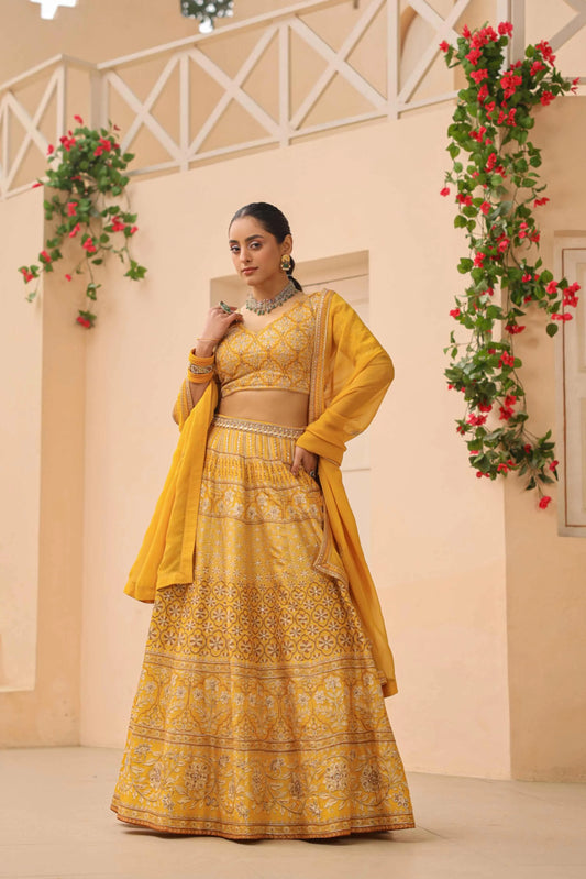 Mustrad Yellow Traditional Print Lehanga with embroidired Blouse & Dupatta