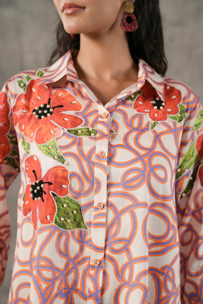 Printed Short Top with applique flower highlighted