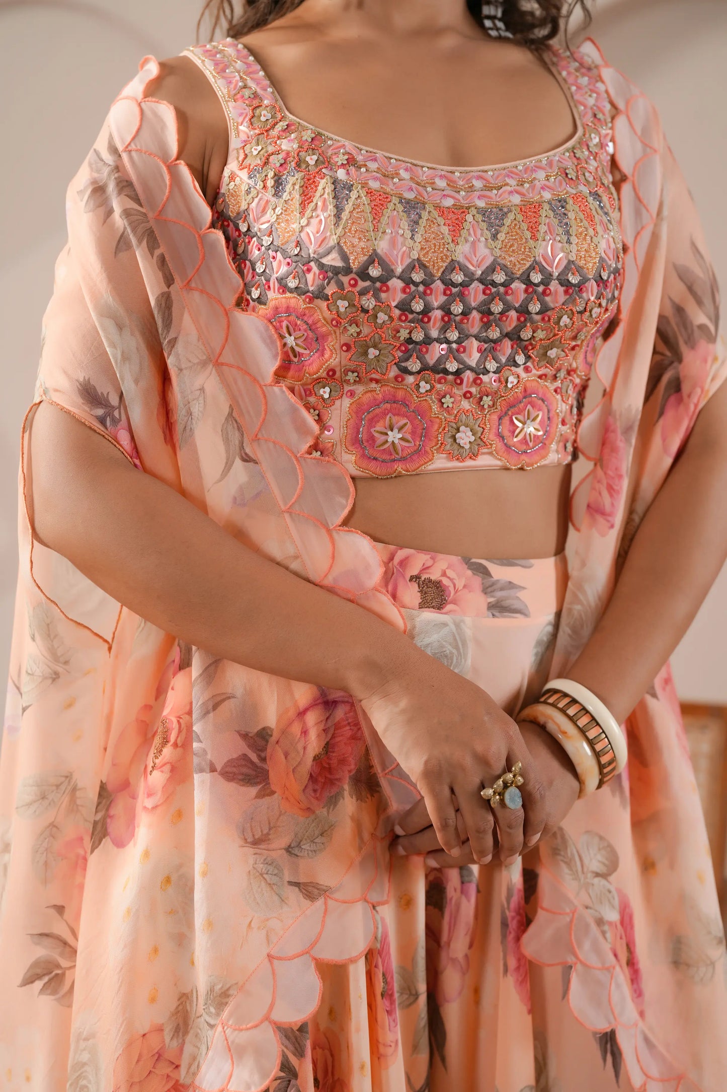 Embroidered Bustier,Printed flared Pants complimented with embroidered Scallop Overlay