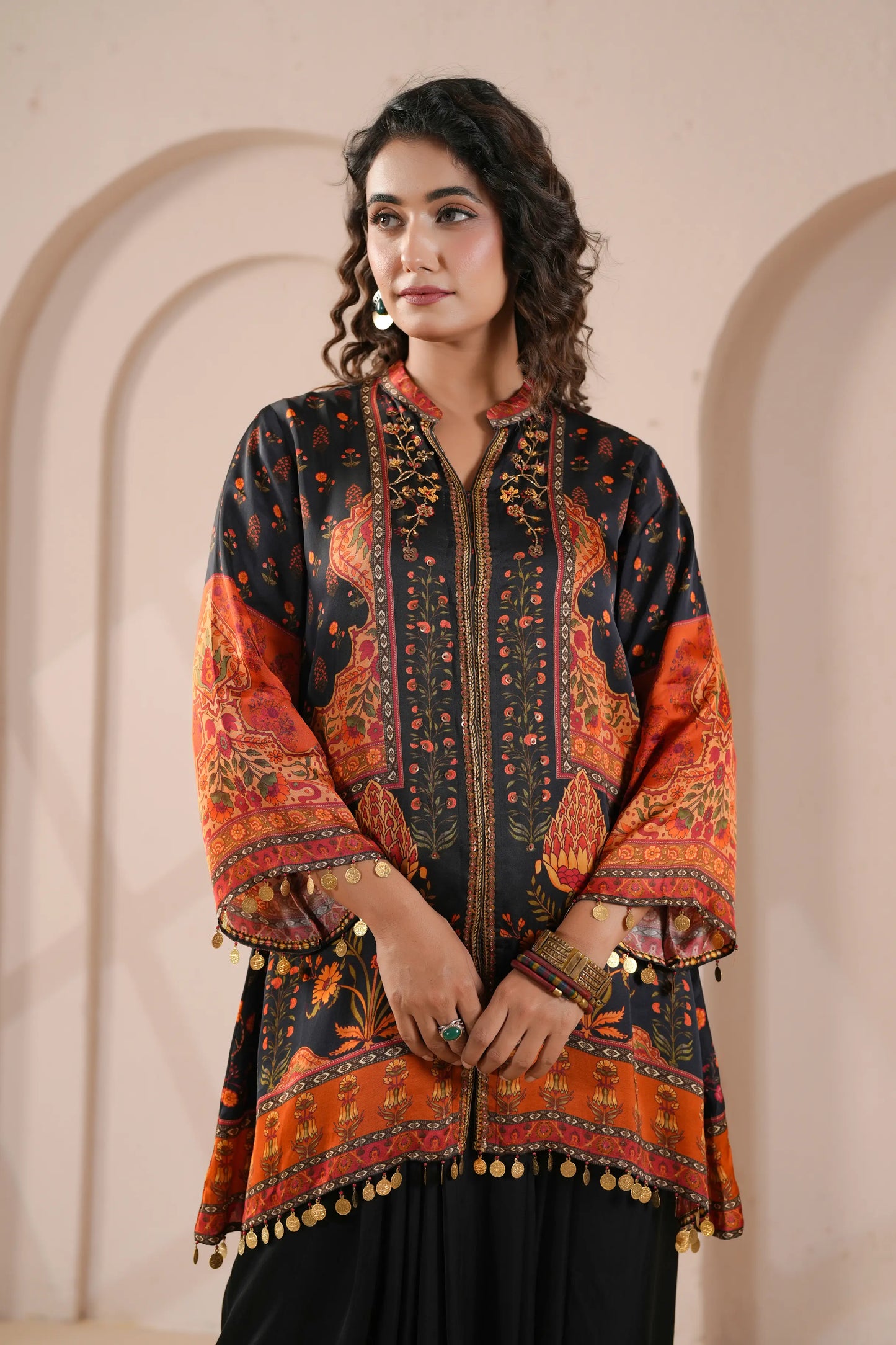 Hand Embroidered Ethnic Kurta with eye catching hemline, paired with harem pant
