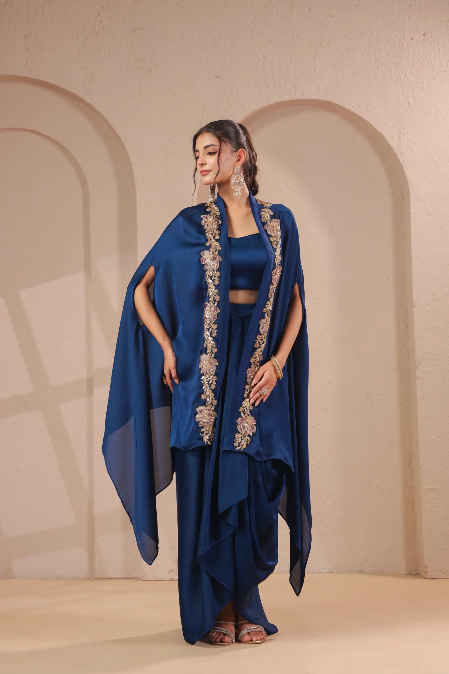 Emboidered overlay with bustier and drape skirt