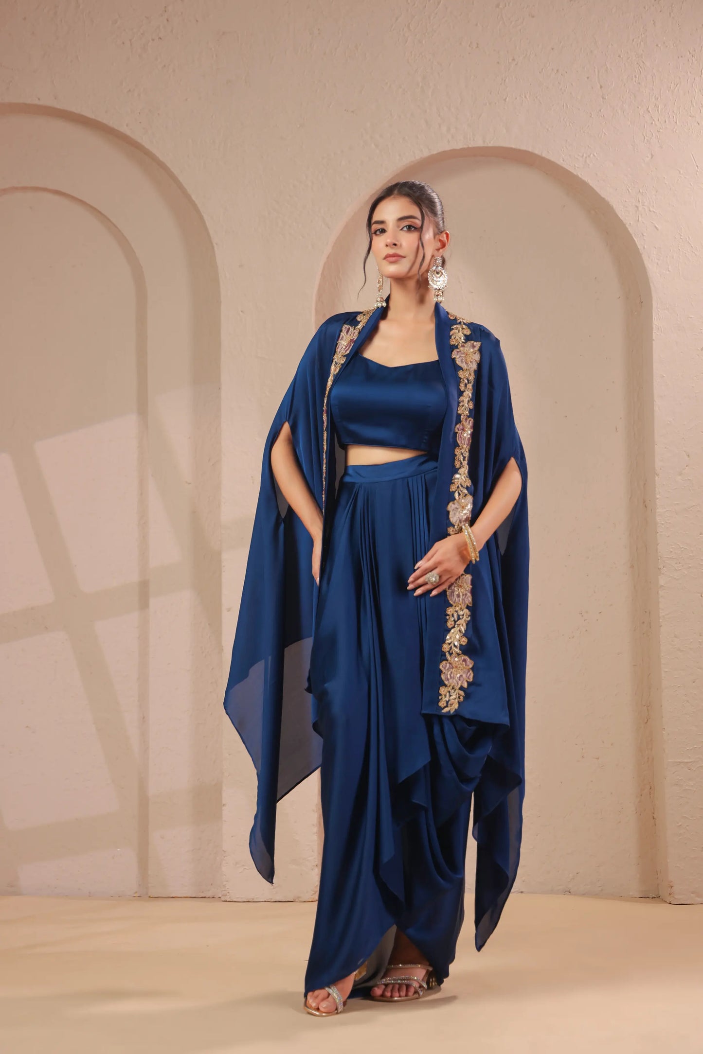 Emboidered overlay with bustier and drape skirt