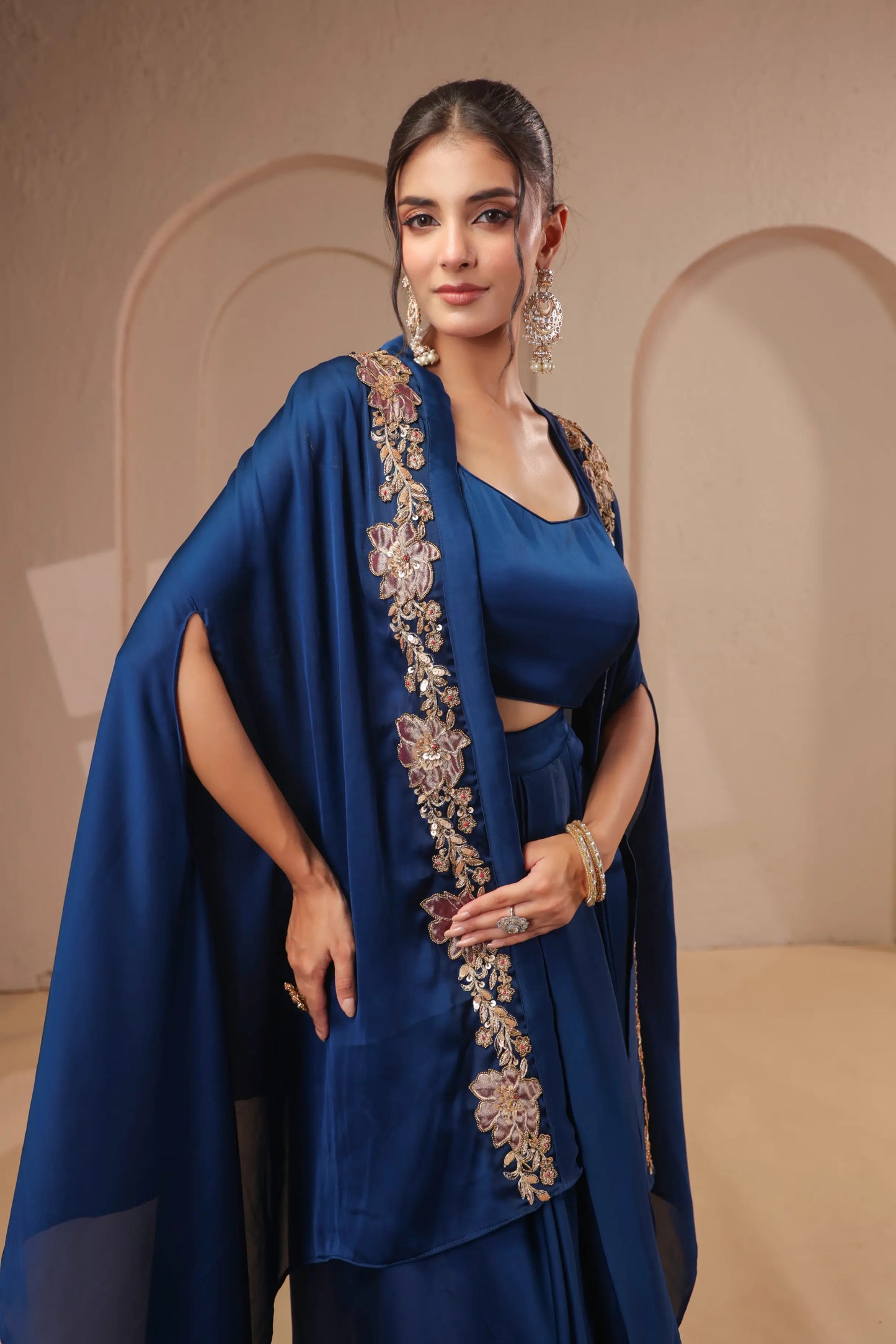 Emboidered overlay with bustier and drape skirt