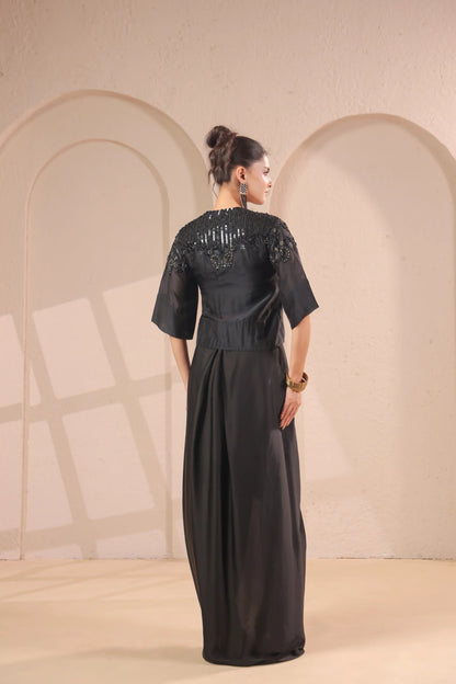 Hand emboidered jacket with bustier and drape skirt
