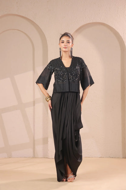 Hand emboidered jacket with bustier and drape skirt