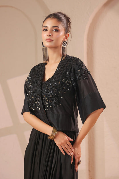 Hand emboidered jacket with bustier and drape skirt