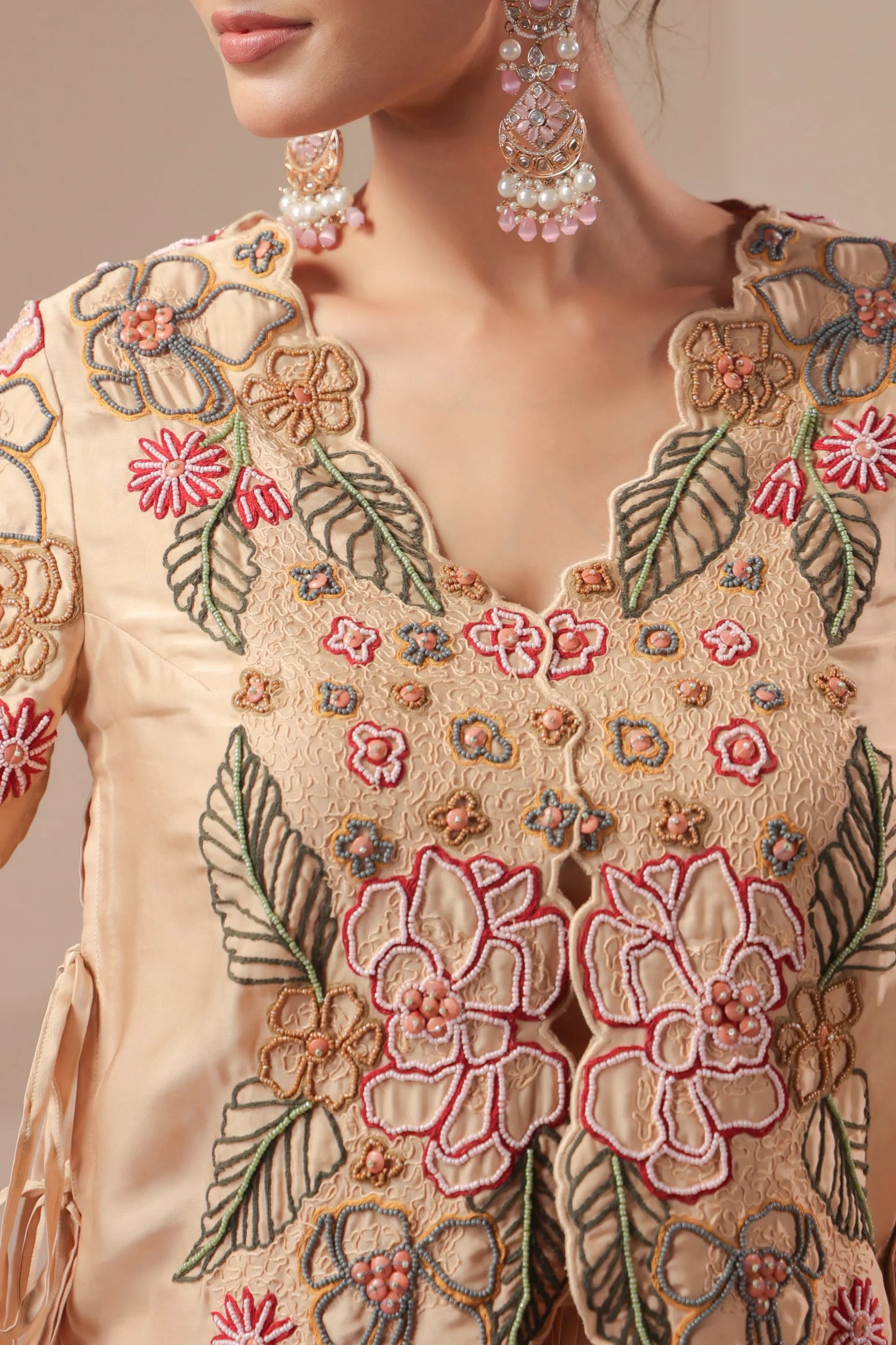 3 Piece Rose-gold bustier with drape skirt & hand emboidered jacket