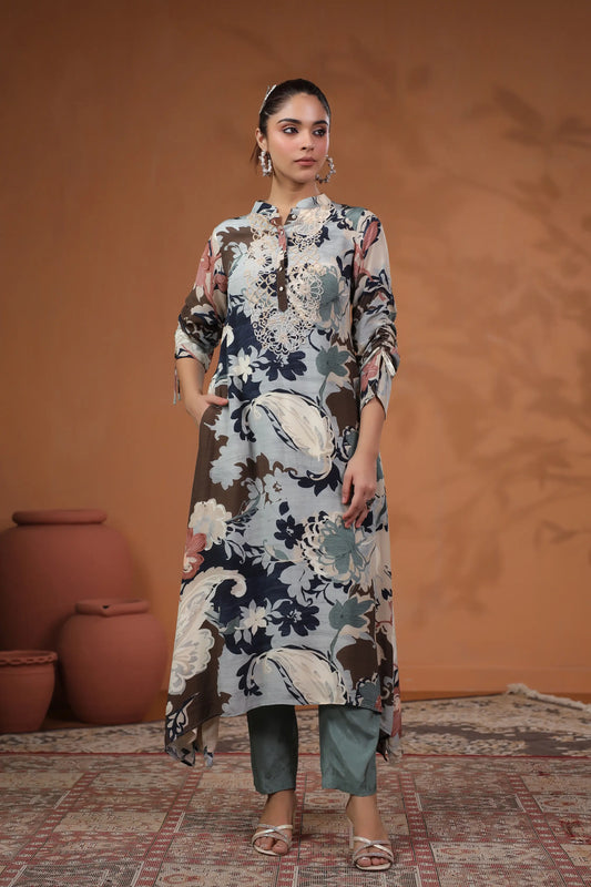 Printed Asymmetrical hemline Kurta with hand Emb. Detail
