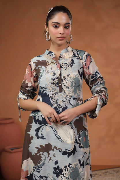 Printed Asymmetrical hemline Kurta with hand Emb. Detail