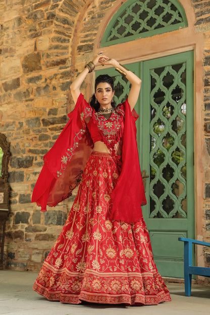 A red colour full traditional Print lehanga with heavy blouse & dupatta