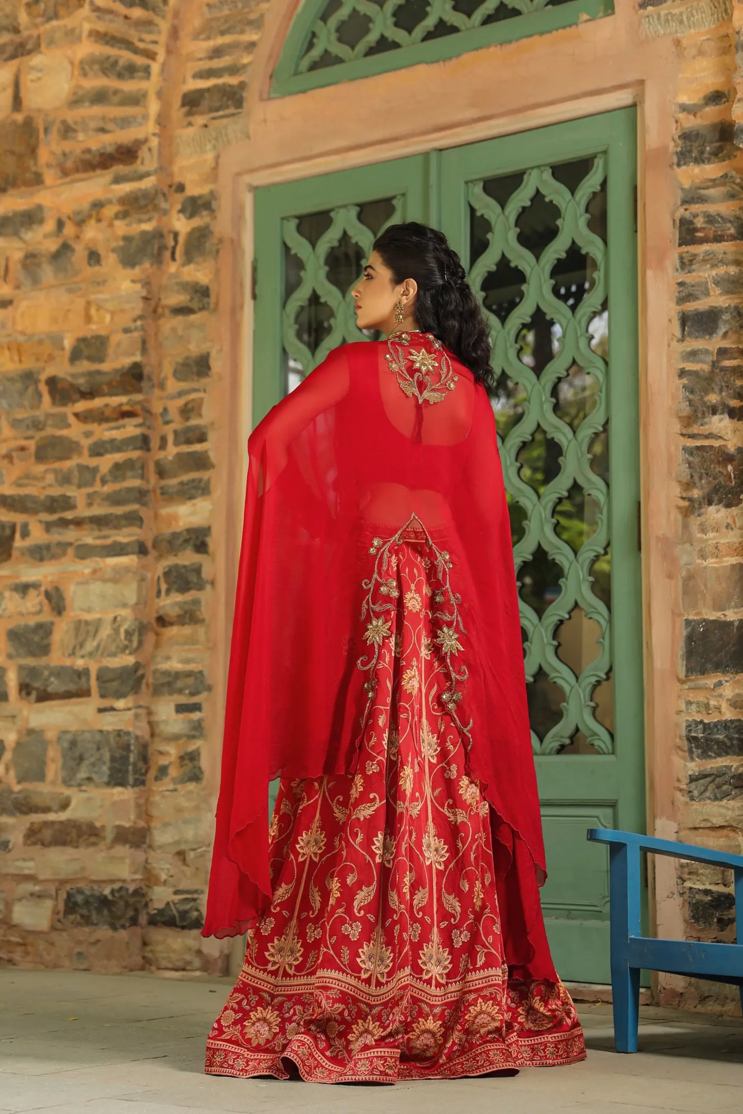 A red colour full traditional Print lehanga with heavy blouse & dupatta