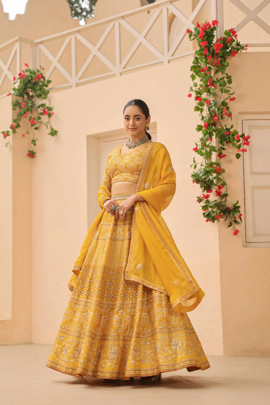 Mustrad Yellow Traditional Print Lehanga with embroidired Blouse & Dupatta