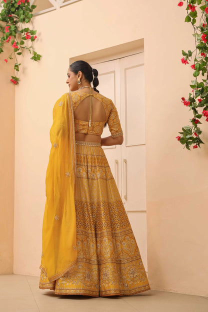 Mustrad Yellow Traditional Print Lehanga with embroidired Blouse & Dupatta